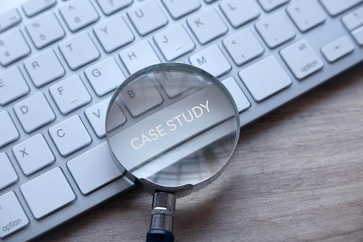 benefits of case studies in marketing your business magnify glass keyboard