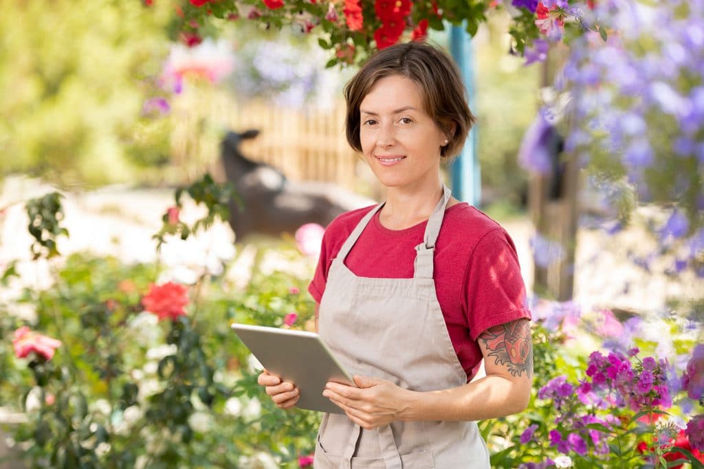 happy gardener with touchpad